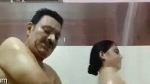 Indian old guy having romance in shower