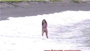 Hawaiian Bikini Babe on the Beach Masturbating