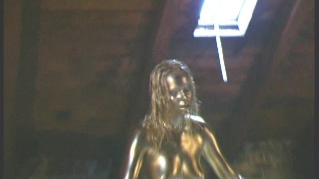 Golden Painted Renata Showing Pussy